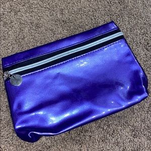 Nordstrom metallic purple pouch.